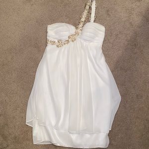White dress with gold detailing
